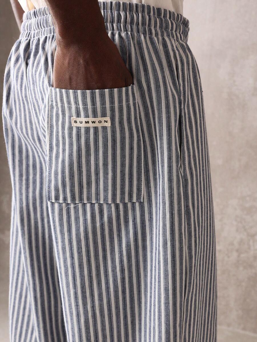 Calça Manfinity Studios Linen Pinstripe Relaxed Trousers — Foto 23