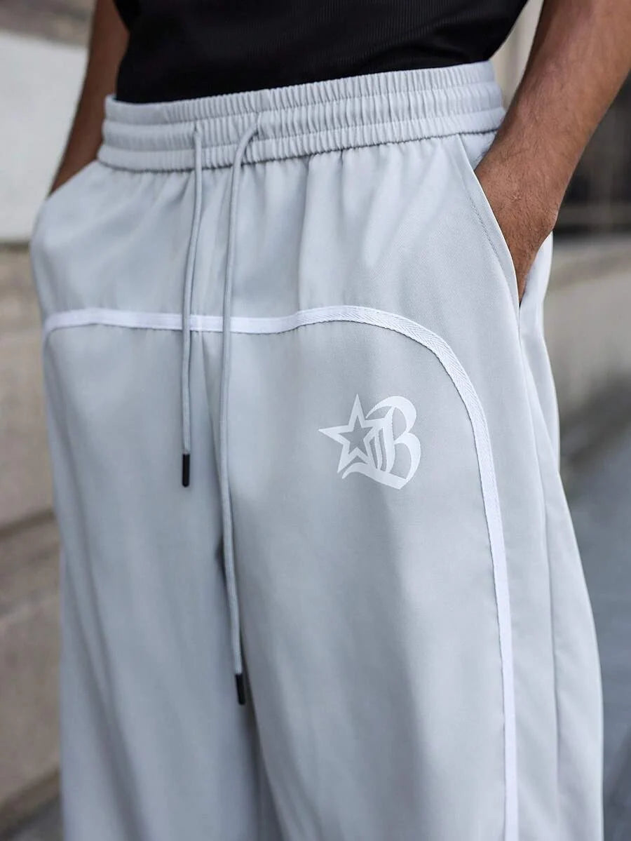 Calça Manfinity Studios Piping Trackpants — Foto 1