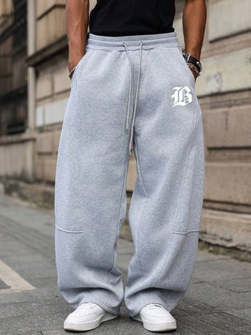 Calça Manfinity Studios Monogram Sweatpants — Foto 1
