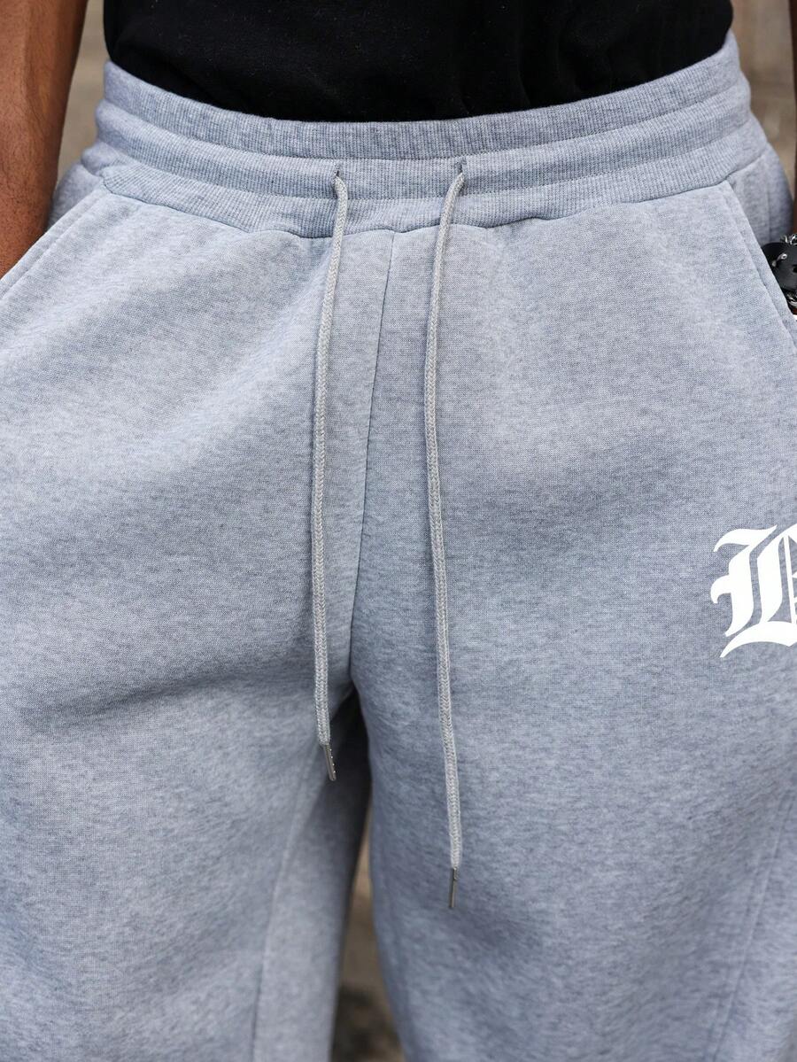Calça Manfinity Studios Monogram Sweatpants — Foto 7