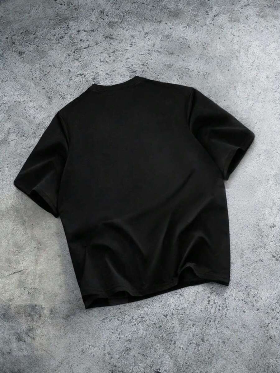 Camiseta Manfinity Folgado Estampa Gráfica Recorte — Foto 27