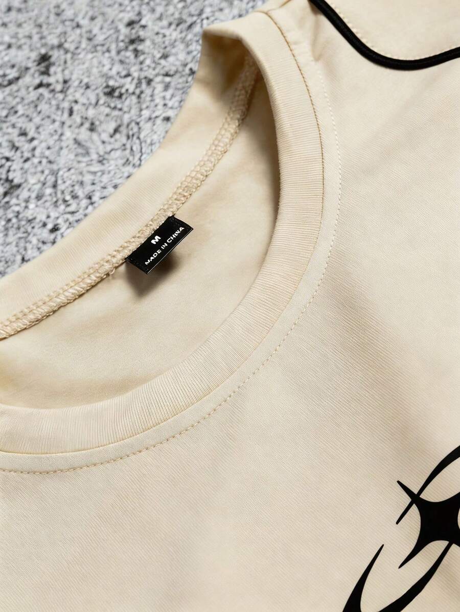 Camiseta Manfinity Folgado Estampa Gráfica Recorte — Foto 19