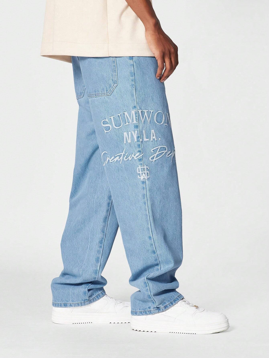 Calça Manfinity Denim reta com bordado — Foto 1