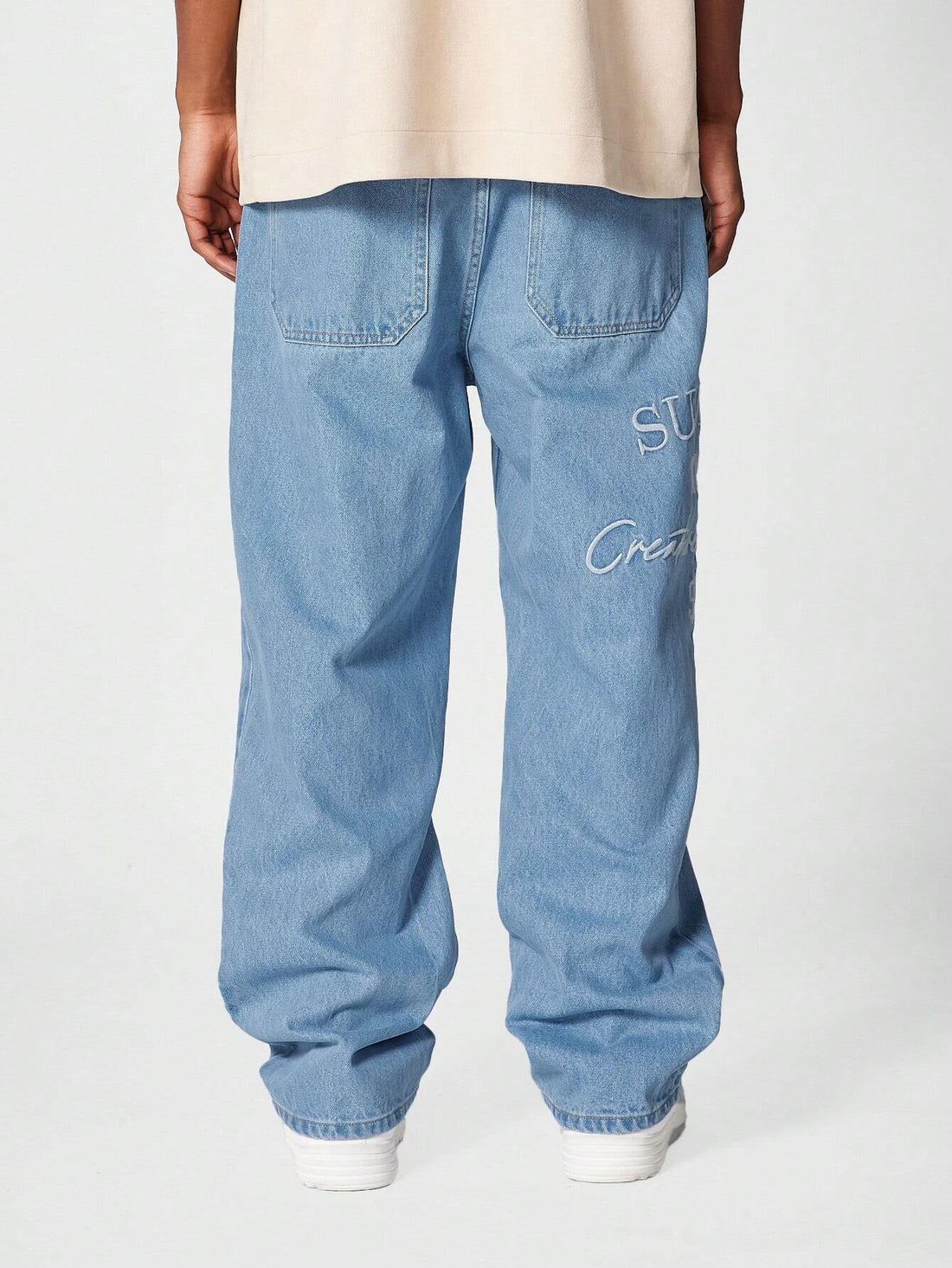 Calça Manfinity Denim reta com bordado — Foto 1